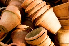 Clay flower pots lying in stacks